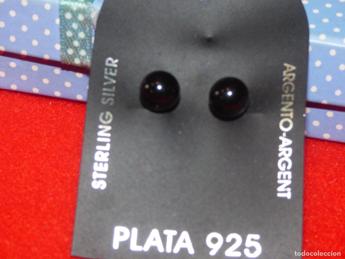 Joyeria: Pendientes plata y bolas de piedras semi preciosas.