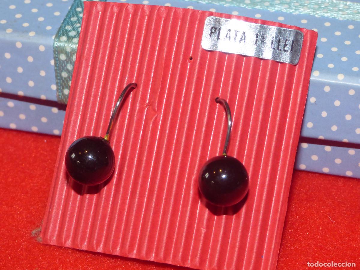 Joyeria: Pendientes plata y perlas.