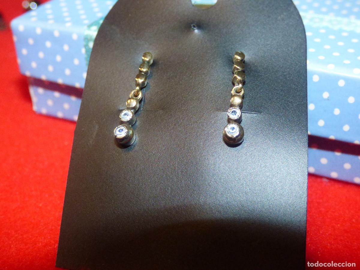 Joyeria: Pendientes, ba&ntilde;o de oro y circonitas.
