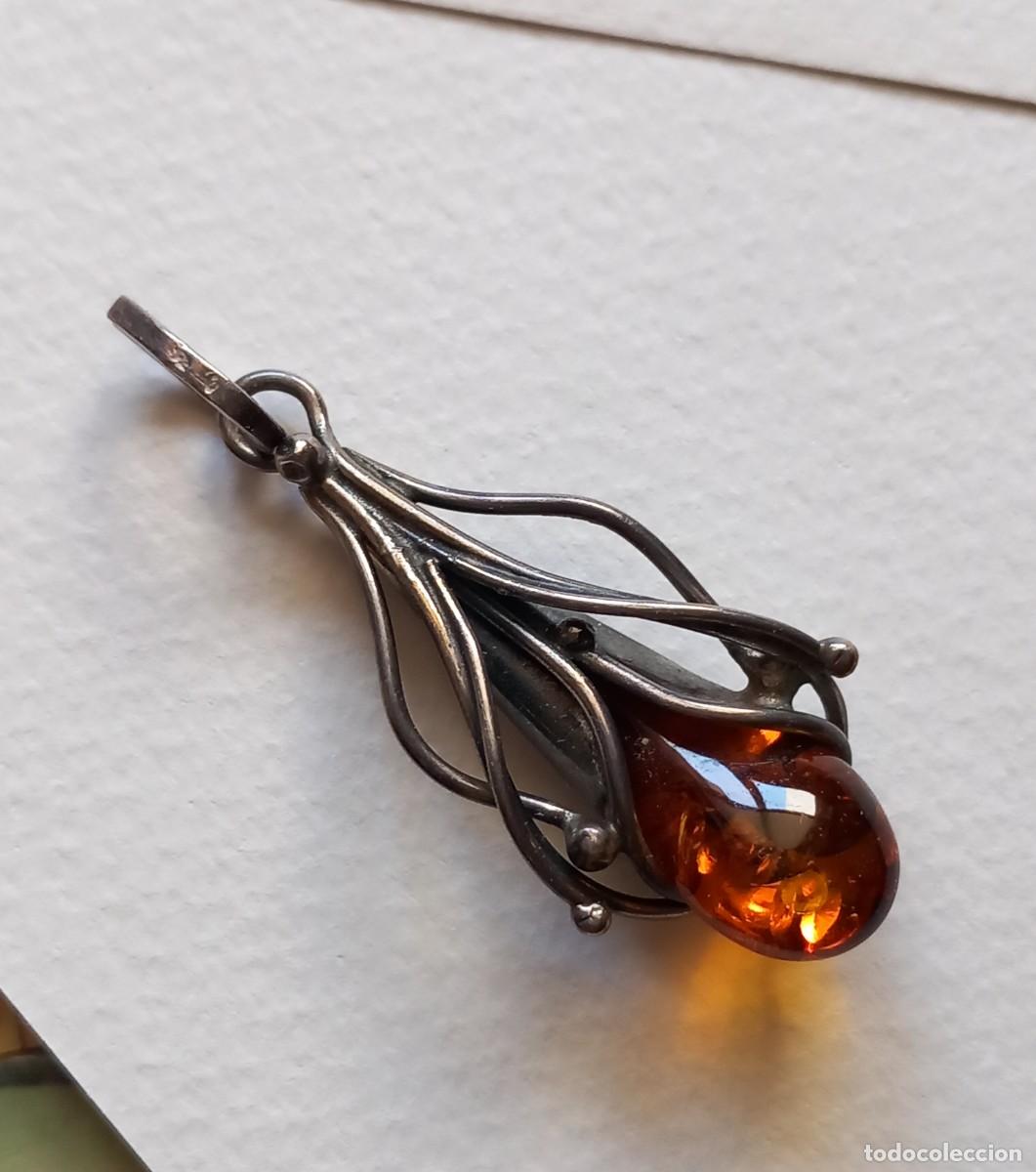 Joyeria: Colgante de plata y &aacute;mbar