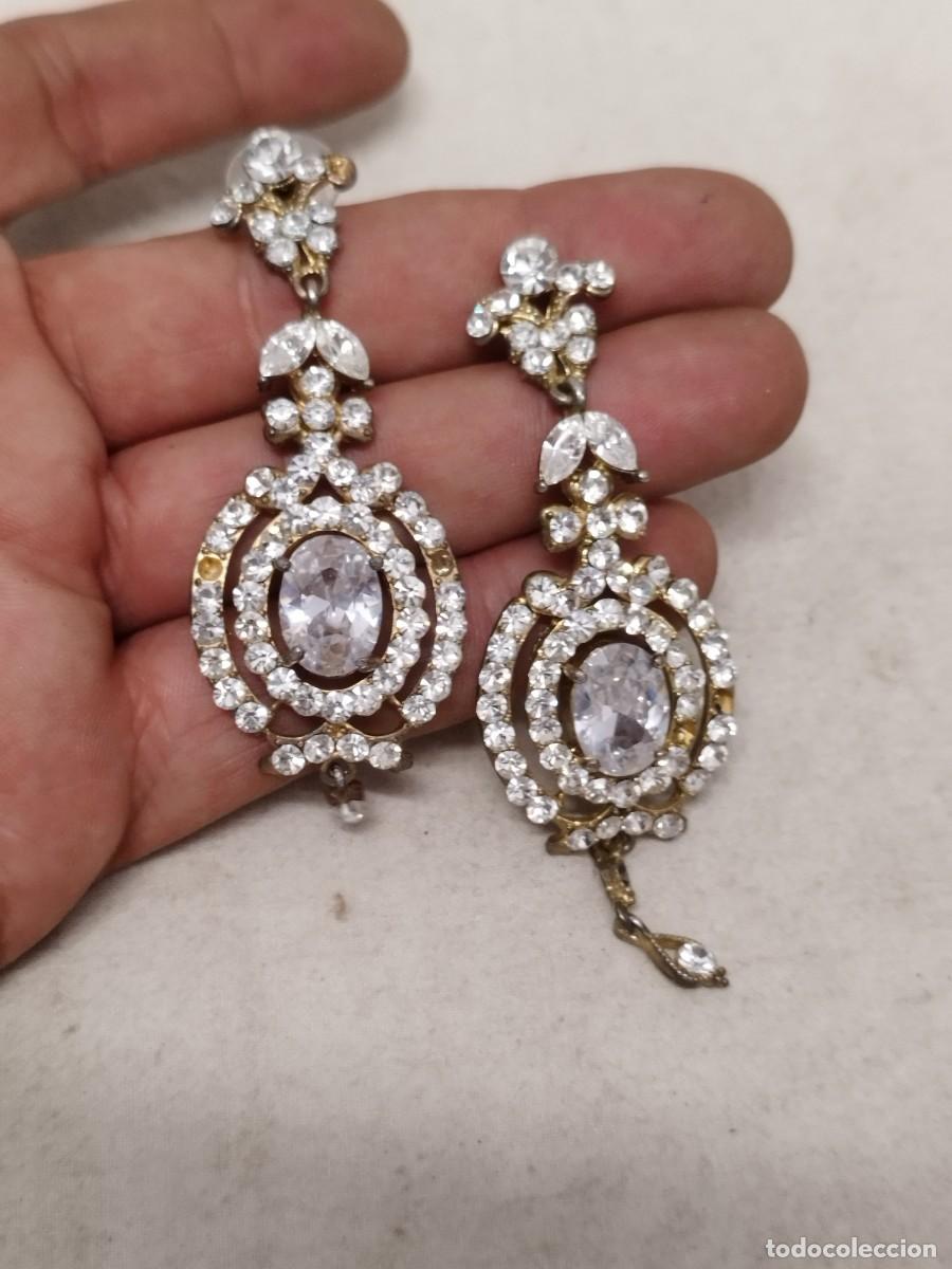 Joyeria: Antiguo par o pareja de pendientes con pedrer&iacute;a a identificar. Con faltas y un cierre a restaurar.