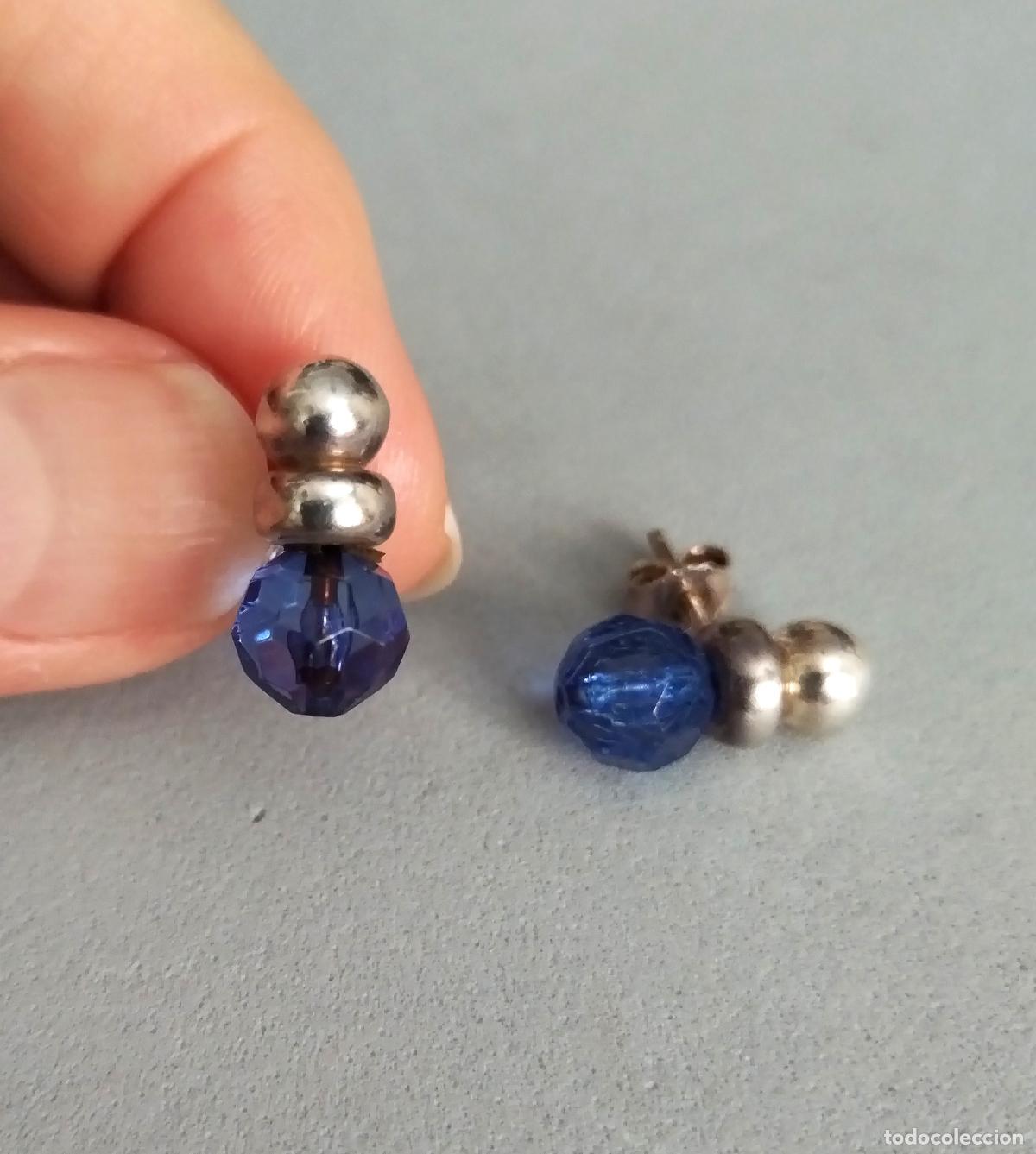 Joyeria: Pendientes de plata de ley con cristal azul, cierre de presi&oacute;n.