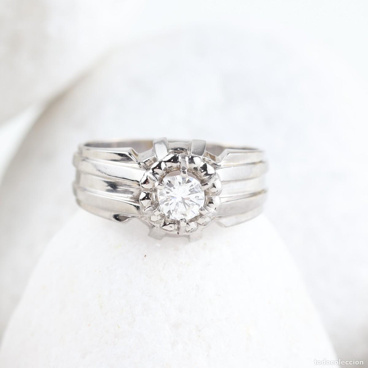 Joyeria: Anillo de caballero en oro 18K con diamante natural de 0,60 ct