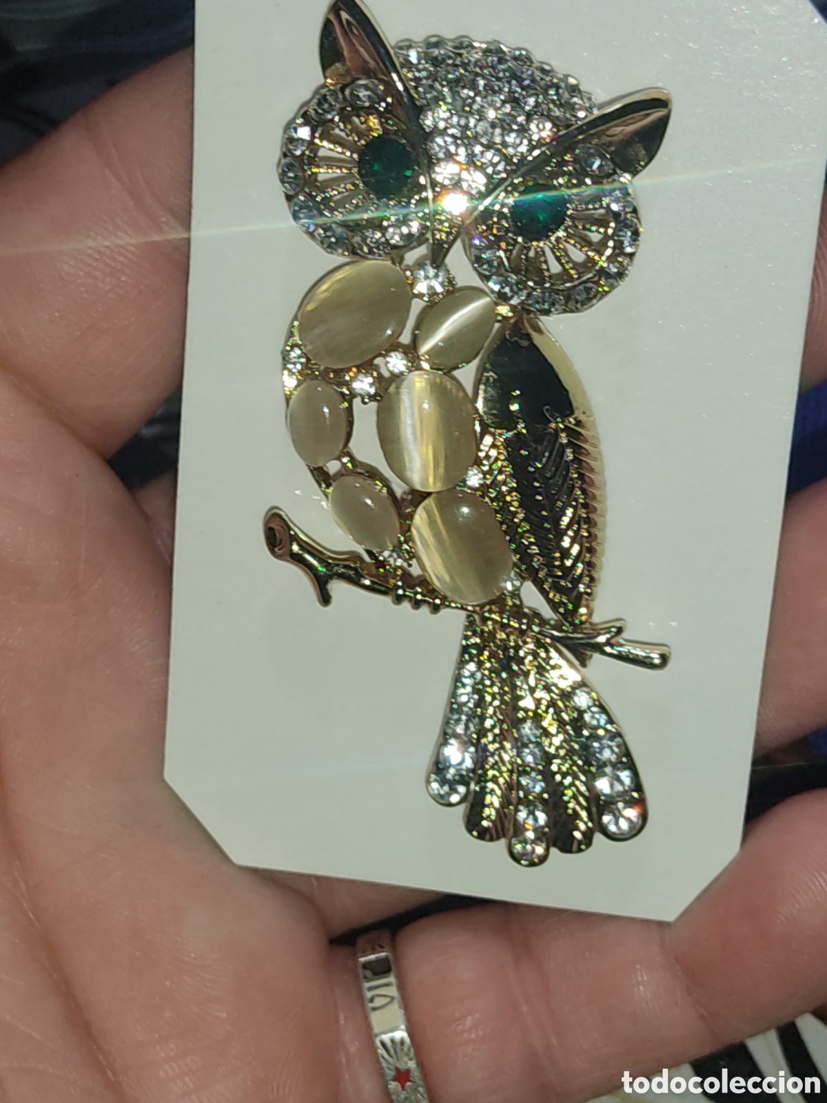 Joyeria: Hermoso broche B&uacute;ho dorado con nacar y circonitas.