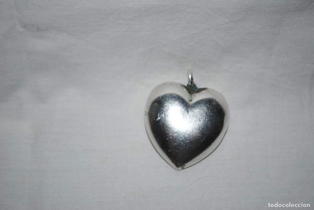 Joyeria: COLGANTE DE PLATA EN FORMA DE CORAZON .