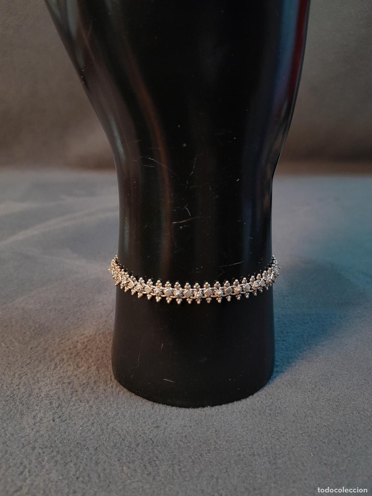 Joyeria: J-4492. PULSERA DE PLATA CON MOTIVOS GEOM&Eacute;TRICOS. 1980 CA.
