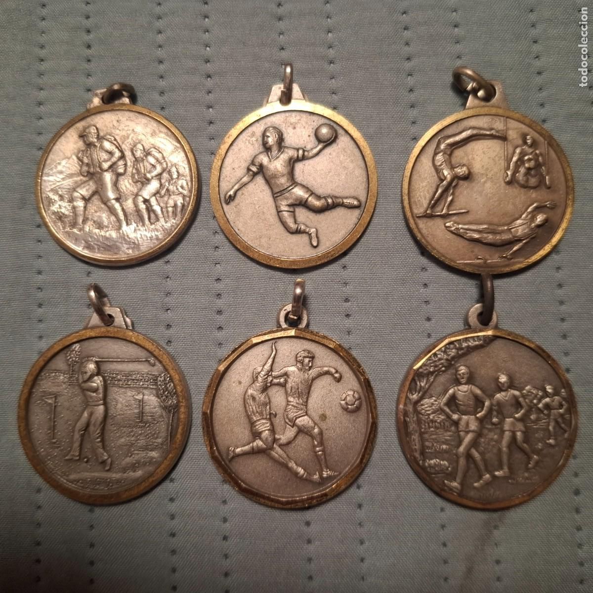 Joyeria: Bonito lote de 6 medallas/colgante vintage de diferentes categor&iacute;as deportivas.