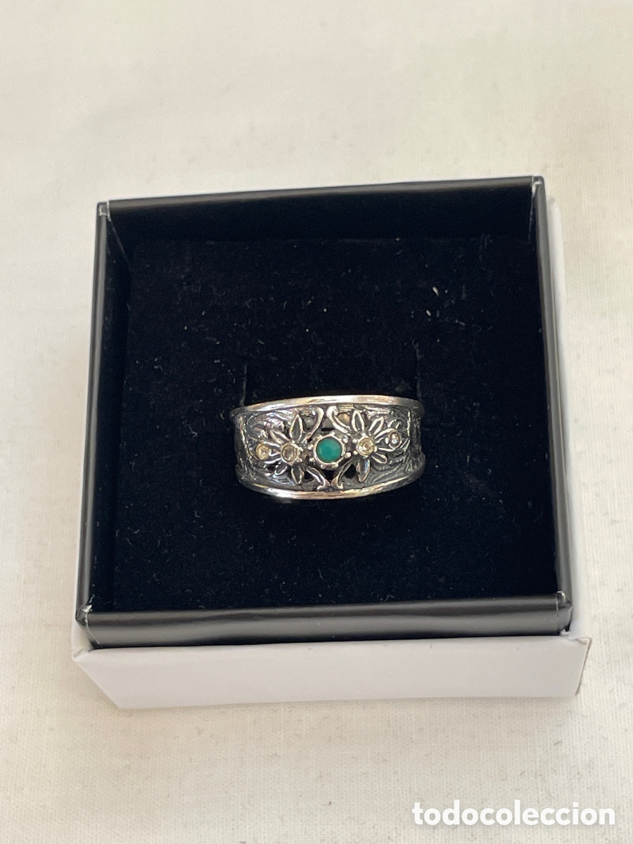 Joyeria: Anillo de plata, esmeralda y topacio blanco