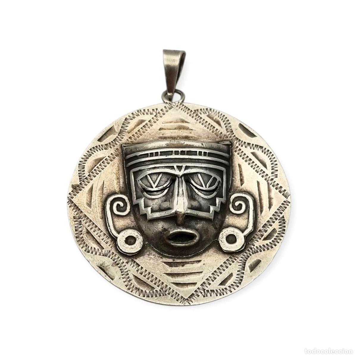 Joaillerie: Colgante reversible de plata 925 con calendario azteca y m&aacute;scara, M&eacute;xico, a&ntilde;os 60-70