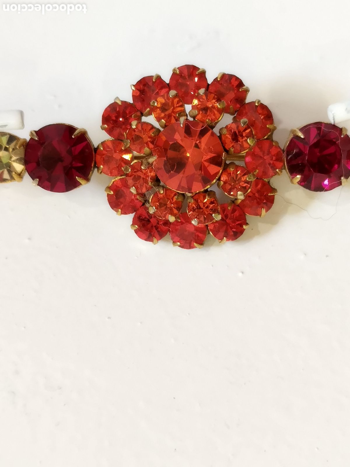 Joyeria: Broche a&ntilde;os 60 en tonos rojizos