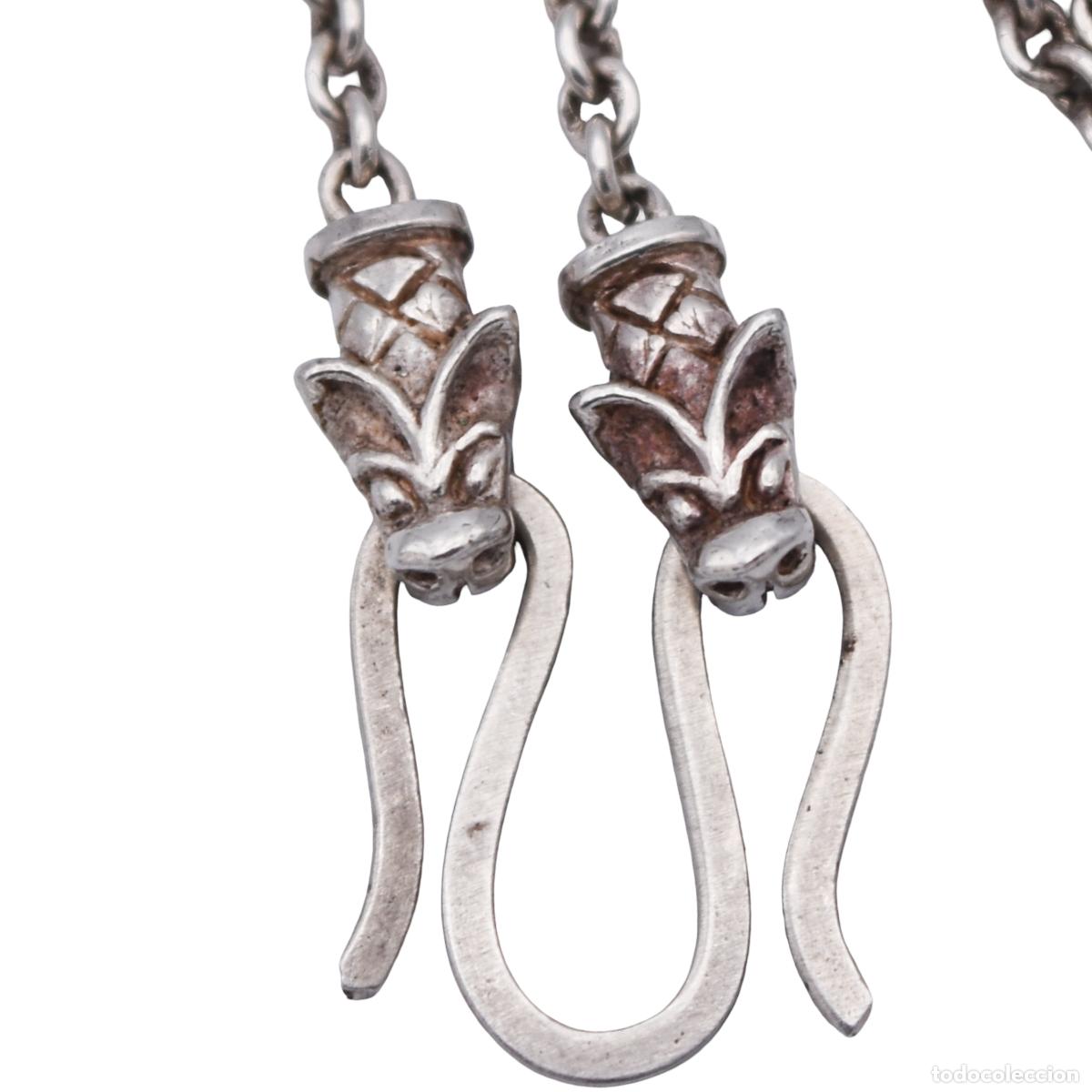 Gioielleria: Cadena de plata con terminaciones en forma de Naga (serpiente/drag&oacute;n)
