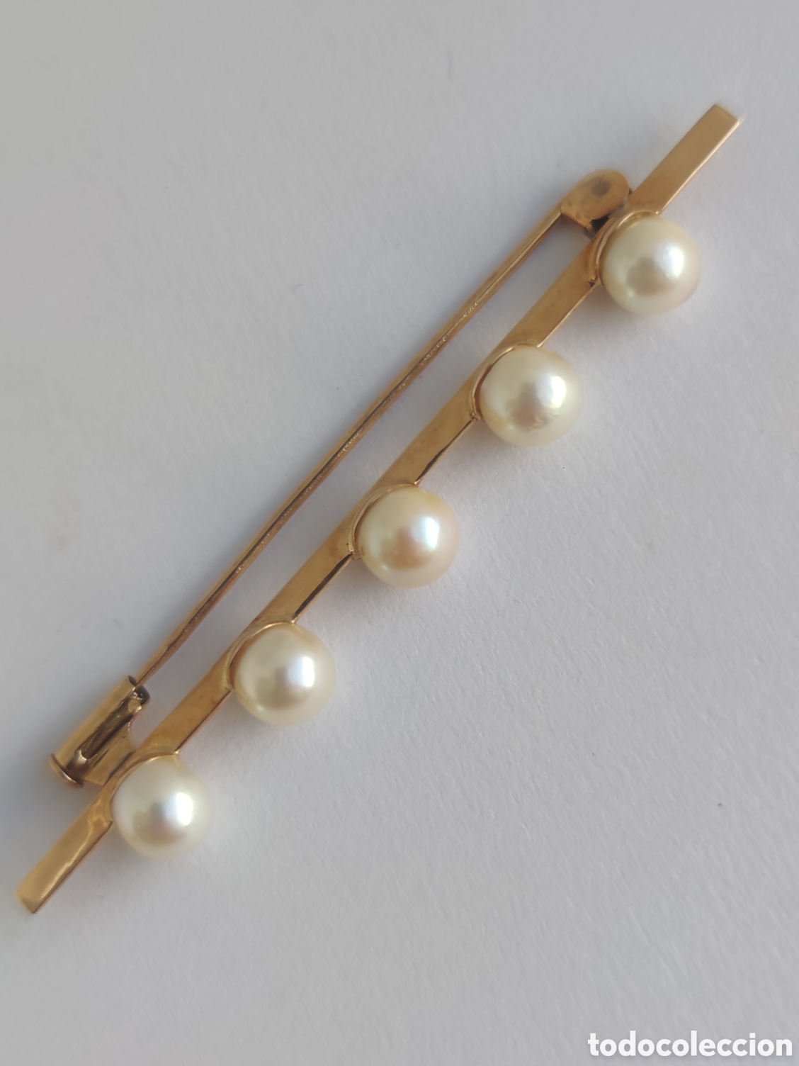 Joyeria: Broche solapa, oro y perlas