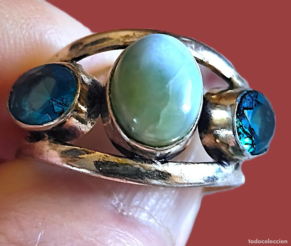 Joyeria: Anillo plata 925 con Piedra Larimar y 2 Topacios.