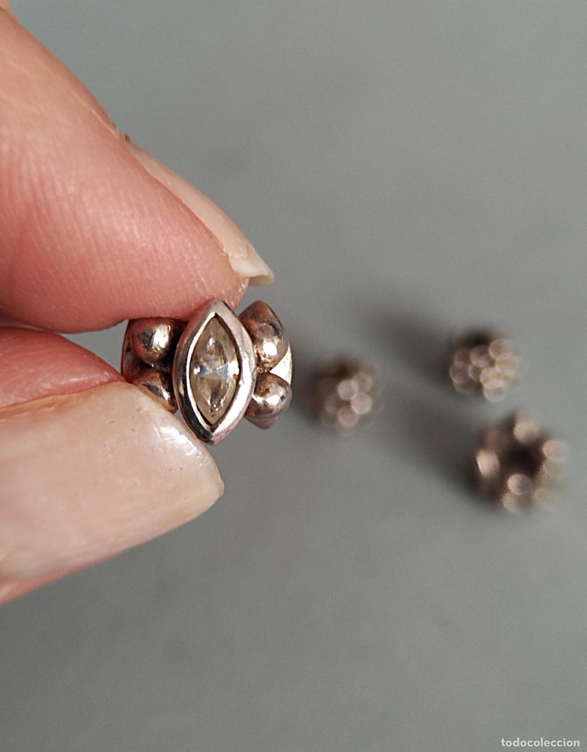 Joyeria: Cuatro colgantes, charms de Plata de ley con circonitas.