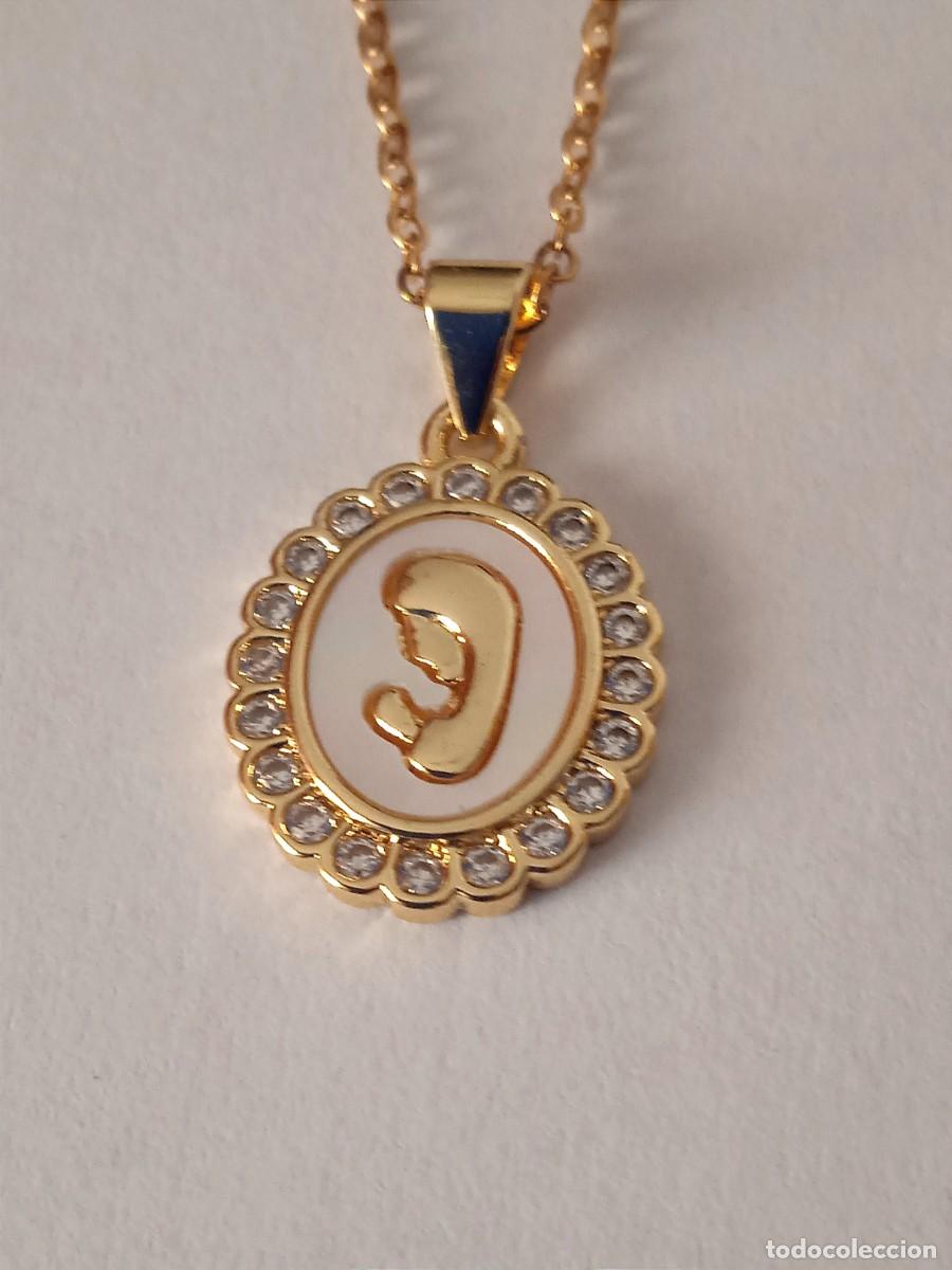 Joyeria: COLGANTE Y CADENA CON PIEDRAS ZIRCONITAS.