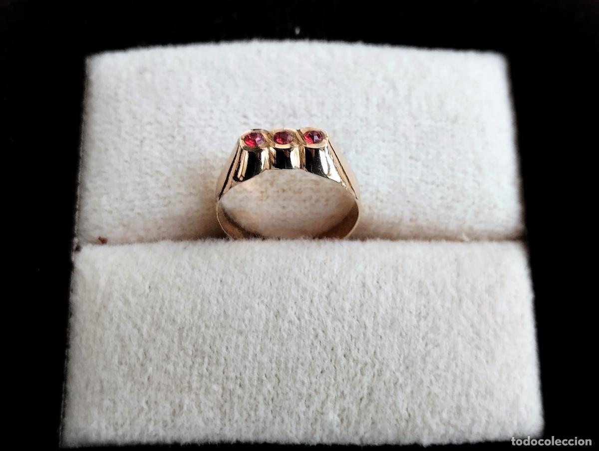 Joyeria: ANILLO DE ORO DE 18 KLTS. INFANTIL O PARA COLGAR DE CADENA - CON PIEDRAS SEMIPRECIOSAS ROJAS - SIN E