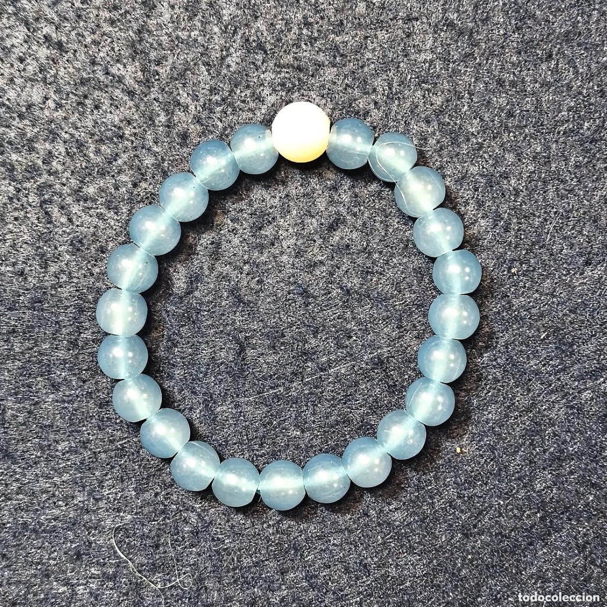 Joaillerie: PULSERA ELASTICA AGUAMARINA 8,5 MM CON PERLA CULTIVADA. TRANSPARENTE