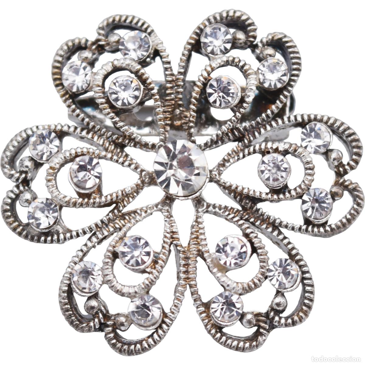 Gioielleria: Broche de metal con filigrana