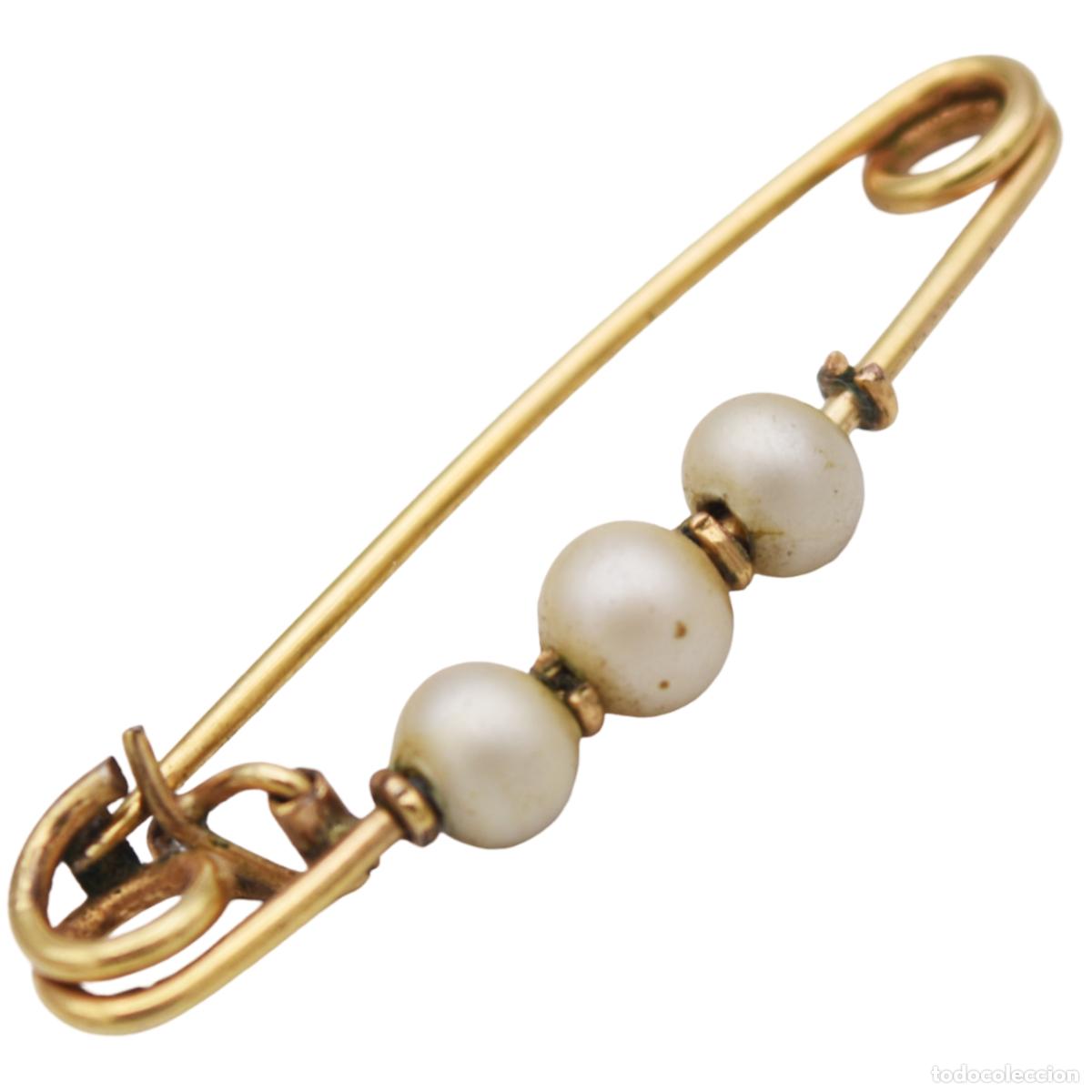 Gioielleria: Broche antiguo ba&ntilde;ado en oro