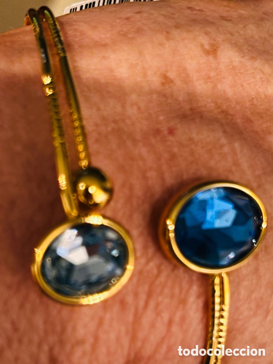Joyeria: Pulsera dorada rematada con dos piedras azules - Foto 2