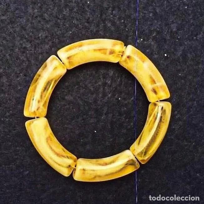 Joyeria: BRAZALETE ELASTICO CON PIEZAS DE RESINA O AMBAR SINTETICO ?? MARFIL DORADO