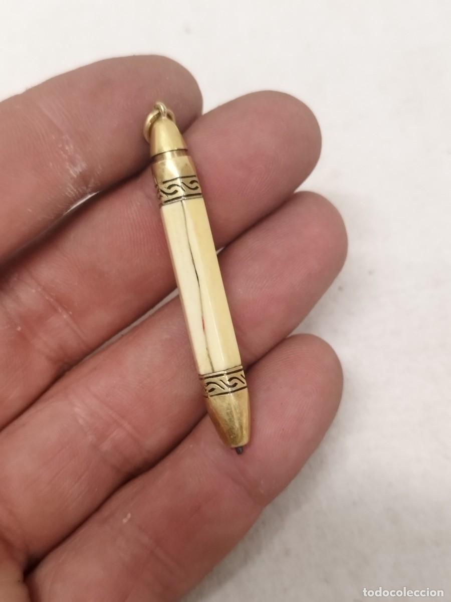 Joyeria: Antiguo lapiz colgante con falta y sin probar.