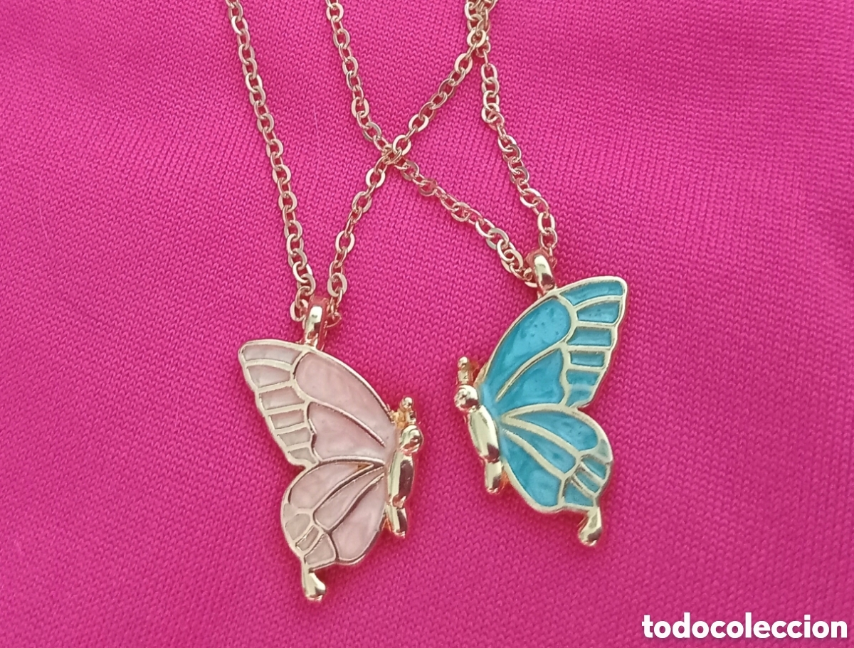 Gioielleria: 4 piezas, 2 colgantes componen una &rdquo;mariposa&rdquo; bicolor rosa, azul y dorada. 1,9cm largo. Muy bonita