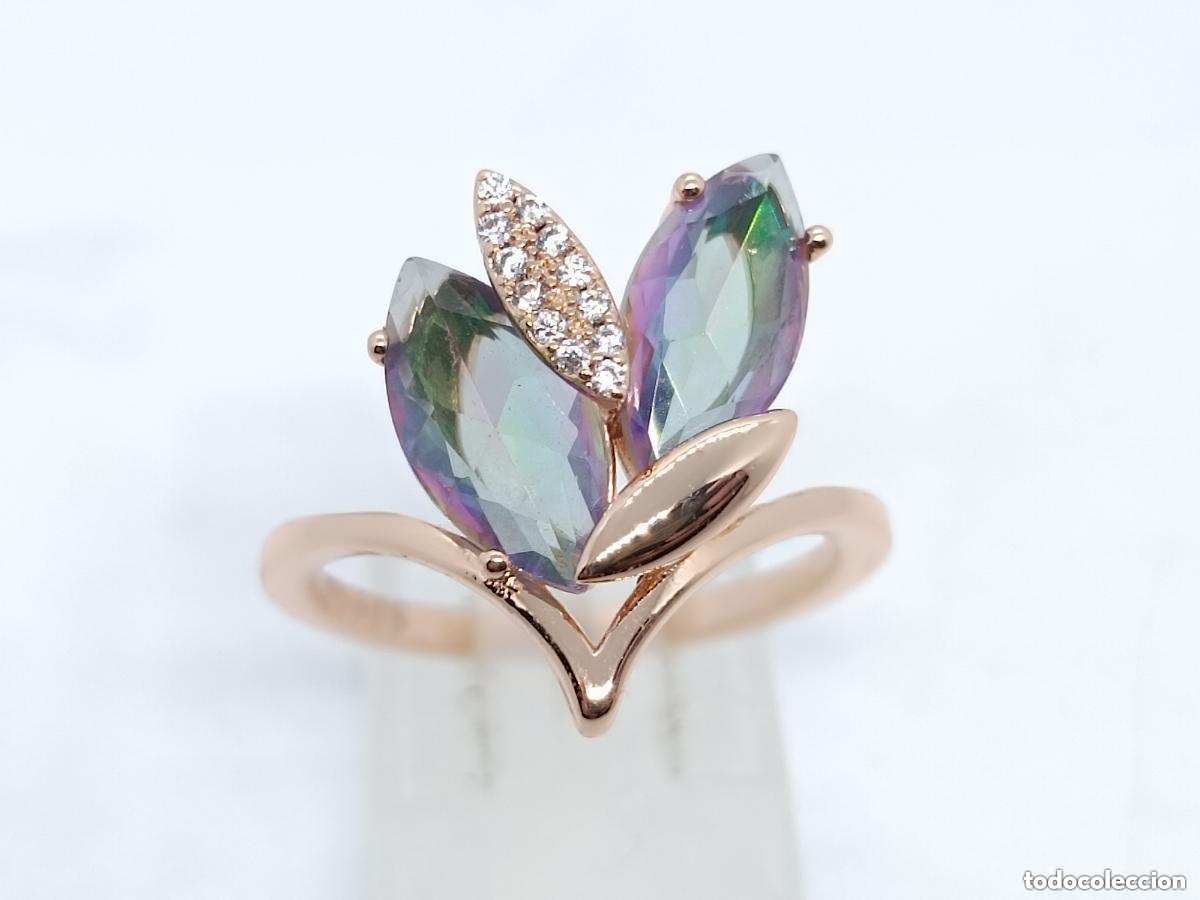 Joyeria: Precioso anillo en oro de 14 quilates con topacios m&iacute;sticos engastados