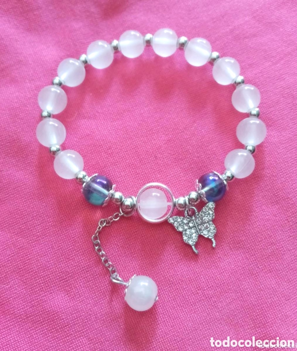 Jewelry: Original pulsera elastica de la suerte con cuentas blancas, azules, transparentes y mariposa brillan