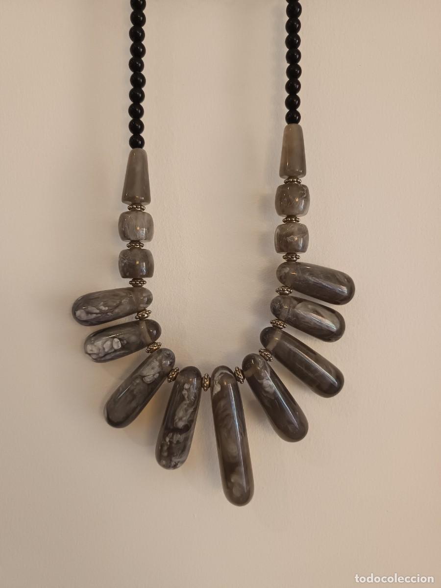 Joyeria: Collar de estilo &eacute;tnico con cuentas y colgantes naturales