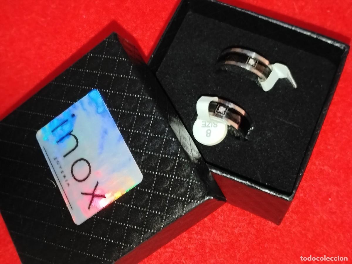 Schmuck: PAREJA DE ANILLOS EN ACERO INOX , TITANEO Y PRECIOSA CIRCONITA (N&ordm;,8,11)