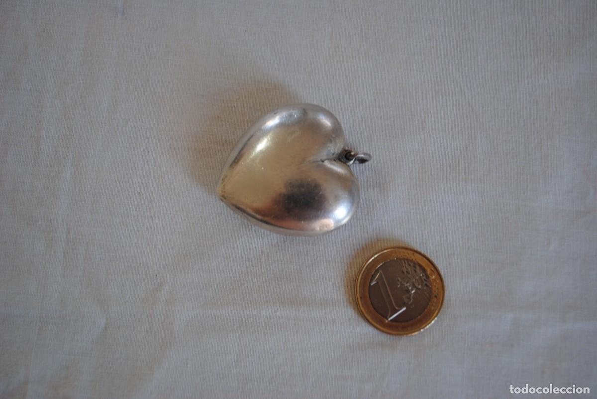 Joaillerie: CORAZON DE PLATA O PLATEADO .