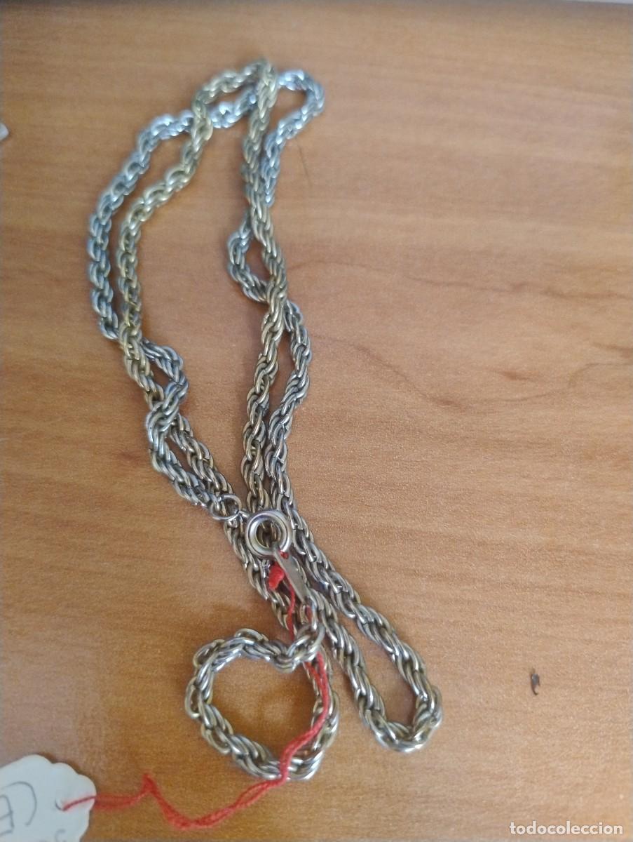 Joyeria: Curioso collar con eslabones dobles, color plata y dorado. 30 cm