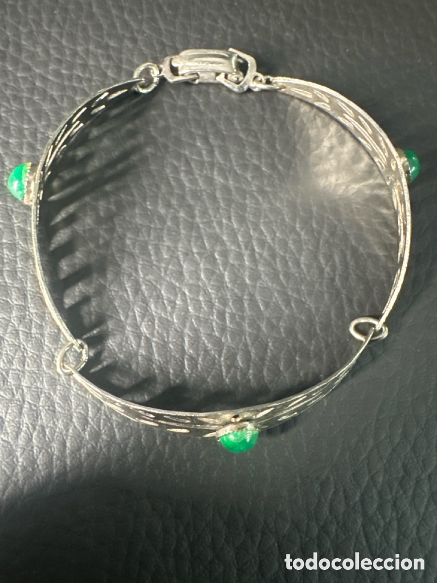 Joyeria: Pulsera articulada de metal plateado y piedra cristal verde
