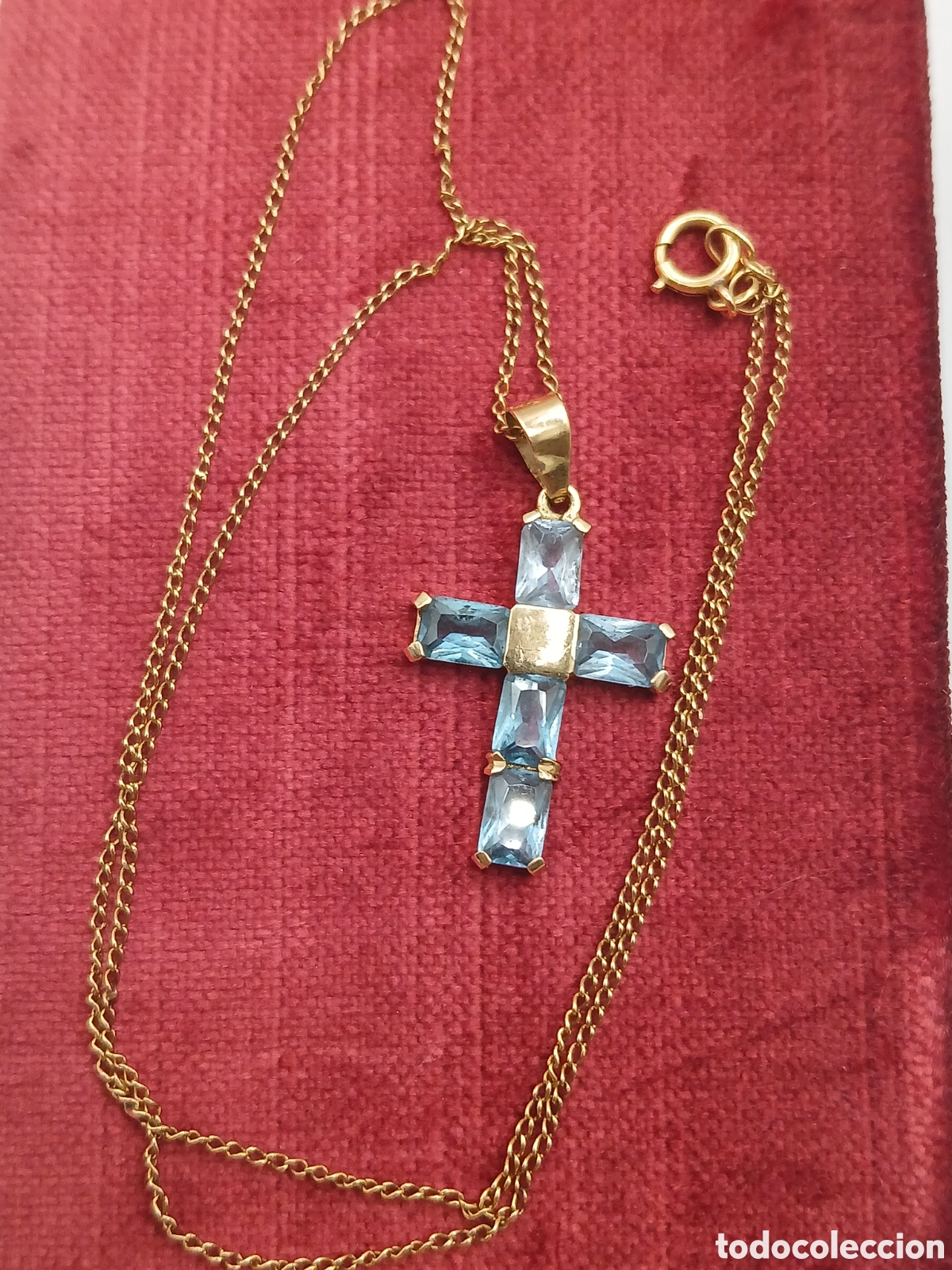 Joyeria: Cruz colgante y cadena oro 18quilates y aguamarina