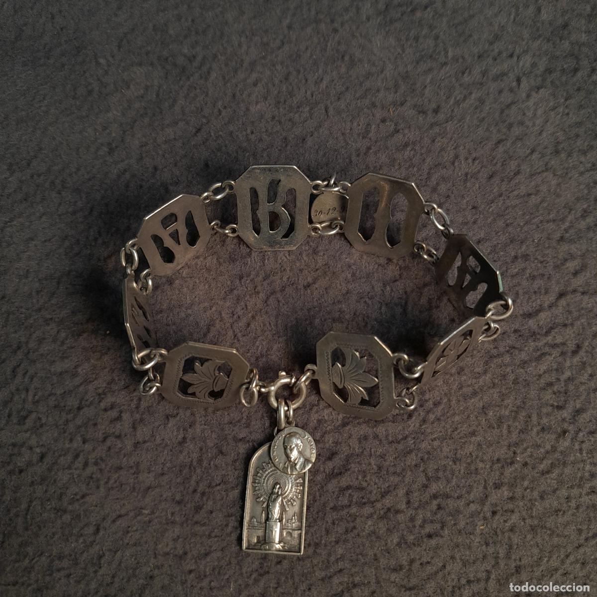 Joalharia: PULSERA NOMINAL (MARIA). ARTICULADA CON MEDALLAS DEVOCIONALES EN PLATA. A&Ntilde;O 1912