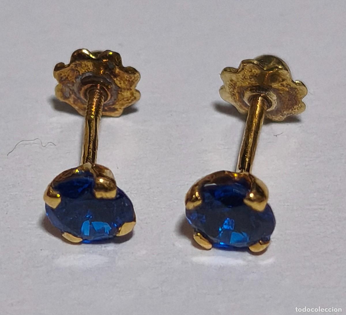 Joyeria: Pendientes de oro 18 quilates con piedra azul redonda sint&eacute;tica