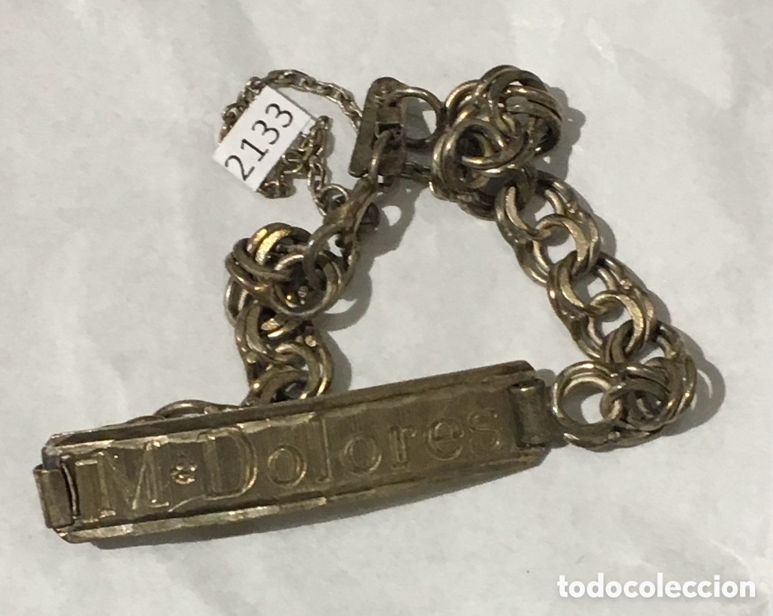 Joyeria: Pulsera. Esclava de plata. &ldquo;M&ordf; DOLORES&rdquo;. A&ntilde;os 70. 11,5 gr.