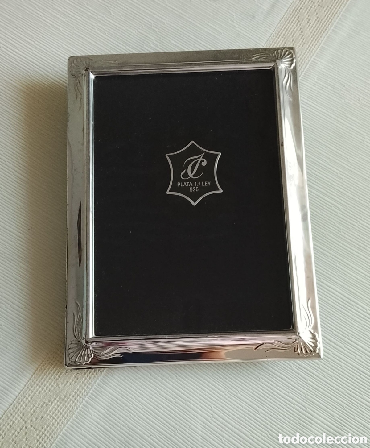 Joaillerie: Portafotos de plata.