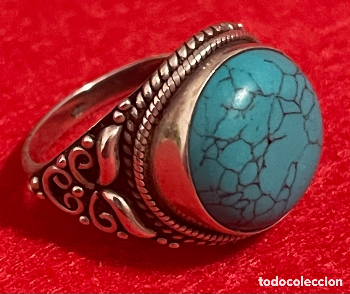 Joyeria: Precioso, anillo en plata de ley contrastada, y piedra color turquesa.