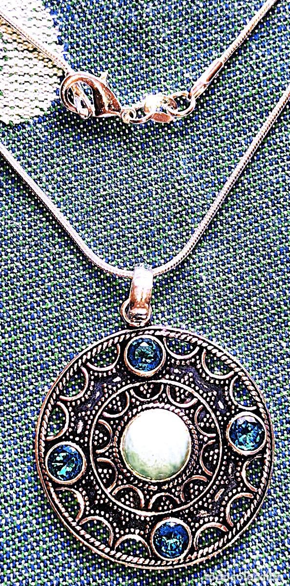 Joyeria: Colgante de Plata con Piedras Larimar ,Topacios y Cadena de plata.
