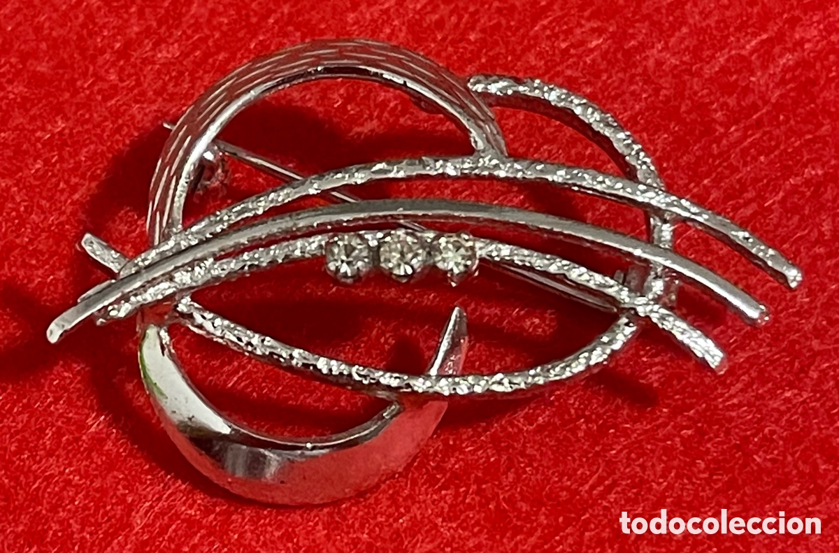 Joyeria: Hermoso, broche en plata de ley contrastada y rodiada