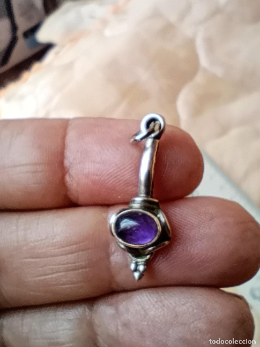 Joyeria: Colgante de plata con amatista. Sellado