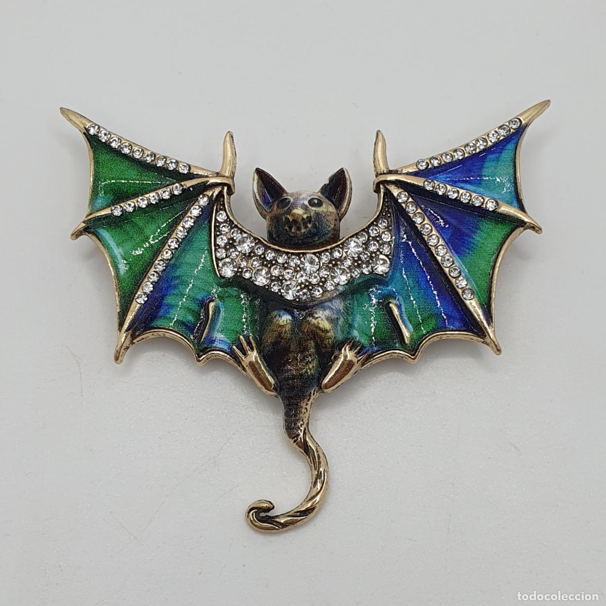 Joyeria: Bonito broche de murci&eacute;lago con alas extendidas, acabados en oro, esmaltes y circonitas.