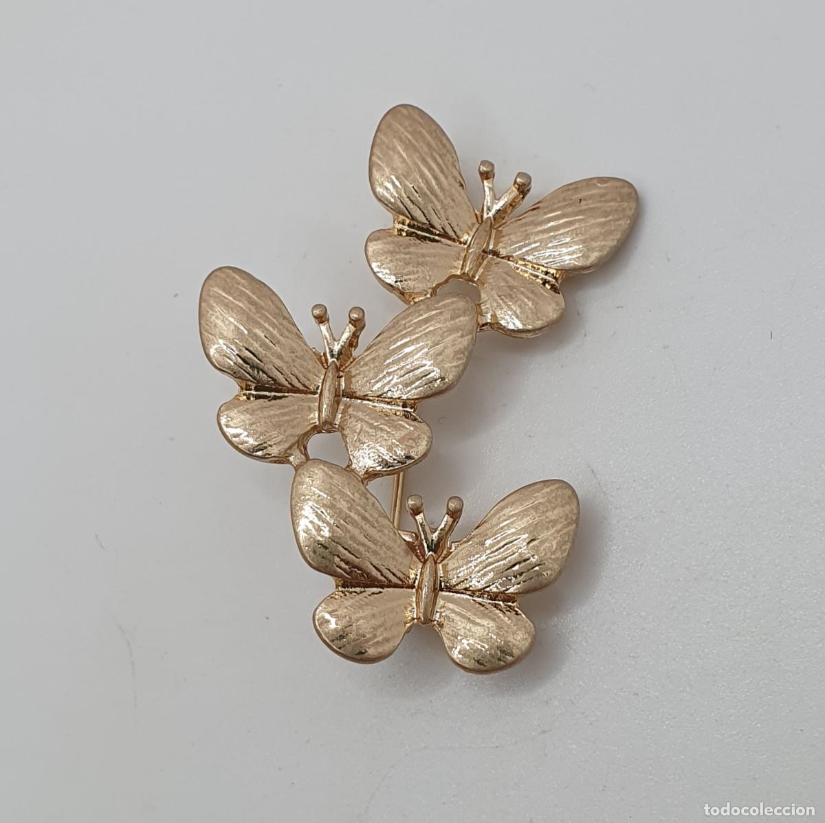 Joyeria: Bonito broche de mariposas con acabados en oro.