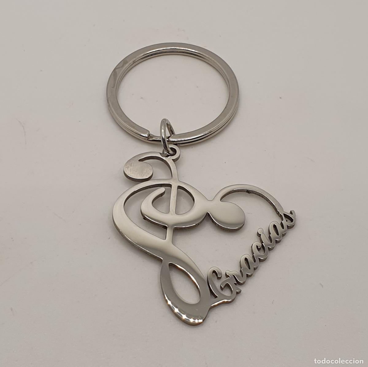 Joyeria: Hermoso llavero ideal para regalar, con la palabra gracias, clave de sol formando un coraz&oacute;n.