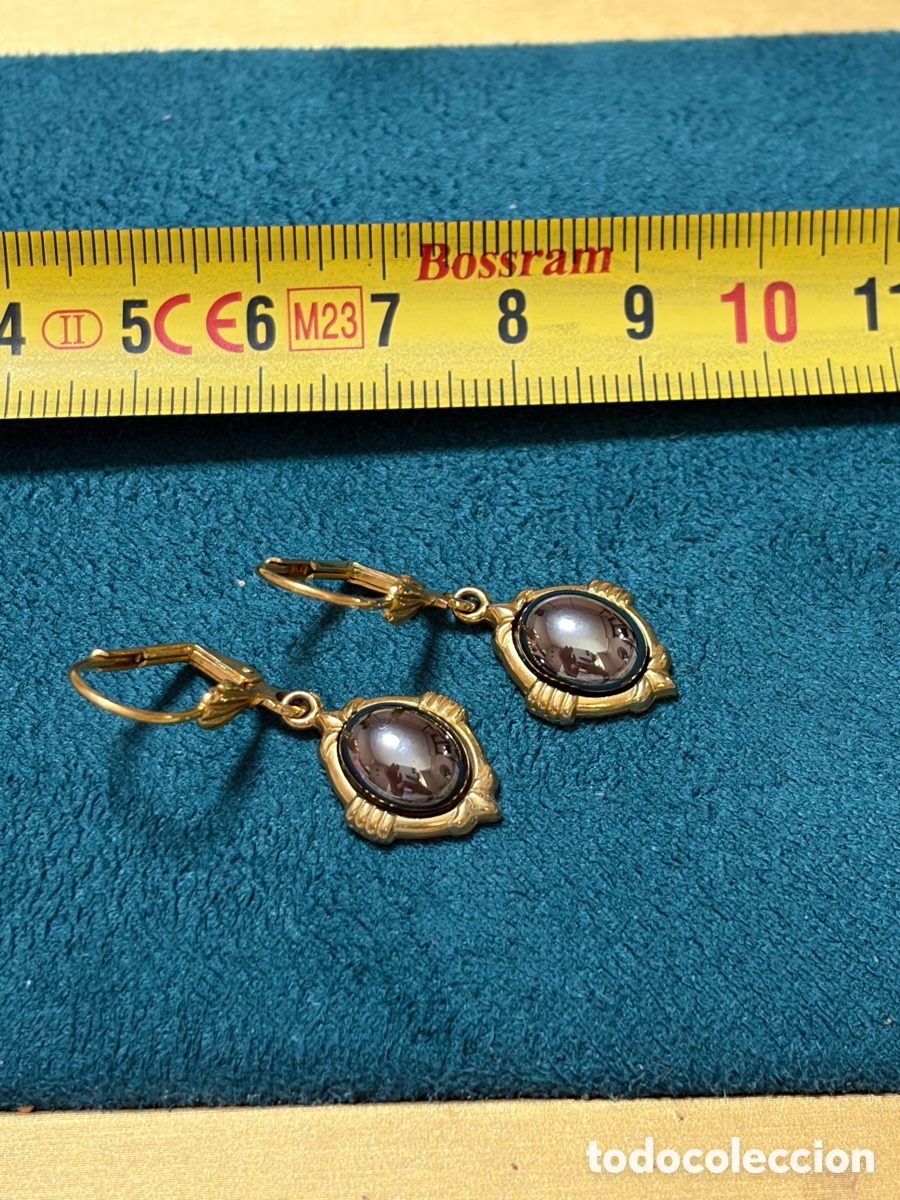 Joyeria: Pendientes dorados de bisuter&iacute;a