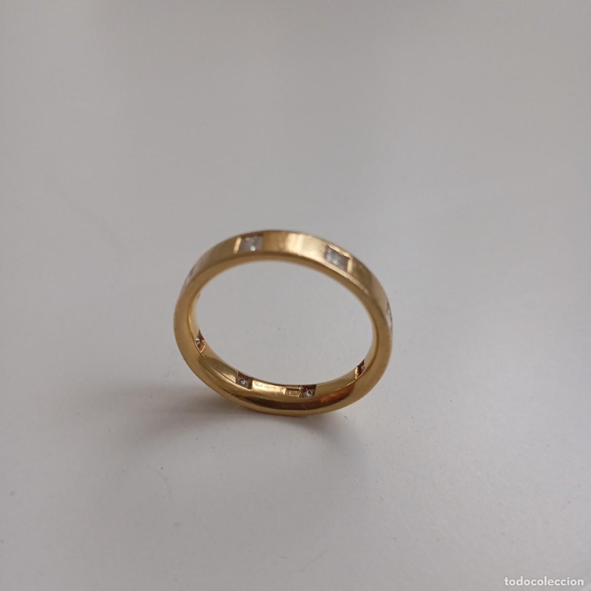 Joyeria: Alianza anillo de oro con piedras incrustradas