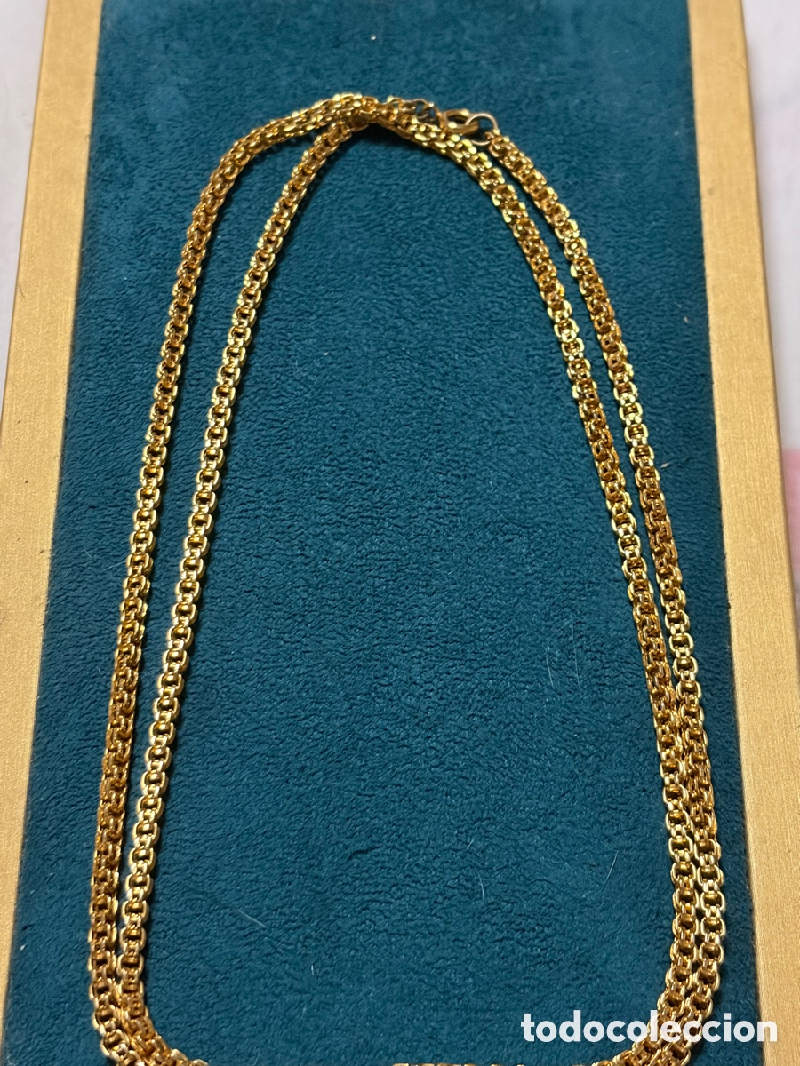 Joyeria: Cadena larga de metal dorado