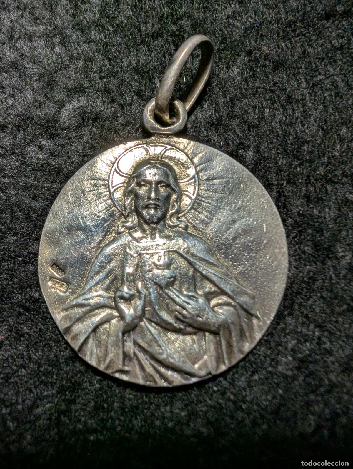Joyeria: MEDALLA DE PLATA DEL SAGRADO CORAZON DE JESUS Y DEL INMACULADO CORAZON DE MARIA.